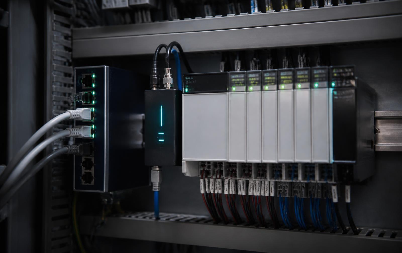 Control cabinet with PLC modules, industrial switch and edge gateway